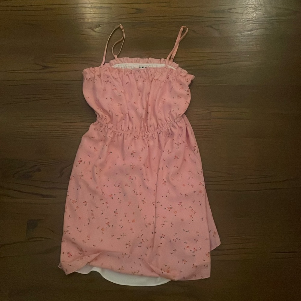 Mini pink sun dress with little flowers on it. Size small and worn.
